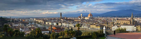 Florence, January 2021: Beautiful Panorama Cityscape of Florence as seen from Piazzale Michelangelo with Old Bridge, Palace of the Town Hall, Cathedral and Basilica of the Holy Cross. Italyのeditorial素材