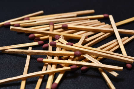close up of matches on black background. selective focus