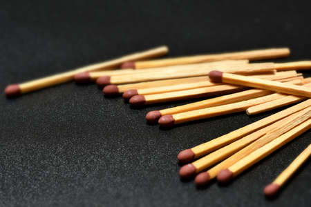 close up of matches on black background. selective focus
