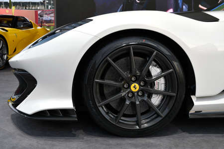 Scarperia, Mugello - 19 November 2021: Detail of alloy wheel of Ferrari car on display during Finali Mondiali Ferrari 2021 at Mugello Circuit in Italy.のeditorial素材