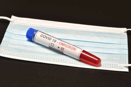 Blood tube for test detection of virus Covid-19 Omicron Variant with positive result on protection...