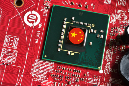 China flag on a processor, central processing unit CPU or GPU microchip on a motherboard or graphic card. Concept for the battle of global microchips production between China, Taiwan, Korea and USA.の写真素材