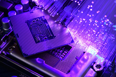 Detail of CPU on socket of a PC motherboard illuminated by a fiber optic lamp. Colorful background...