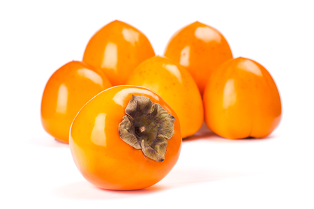 Fresh persimmon on white backgroundの写真素材