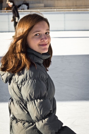 Young Woman Having Fun While Ice Skating