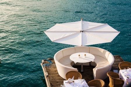 Luxurious restaurant with tables on pier at a Lake in Austriaのeditorial素材