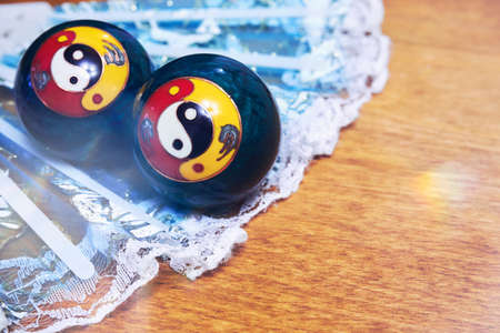 Chinese meditation balls. Baoding balls with yin-yang symbolの写真素材