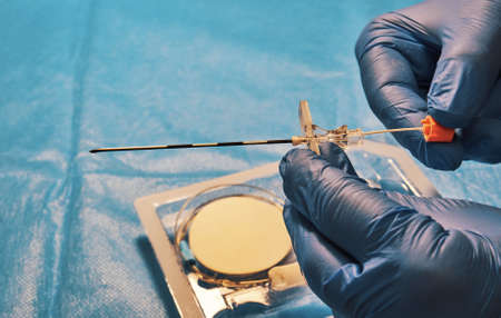 Tuohy needle in doctor's hands close upの写真素材
