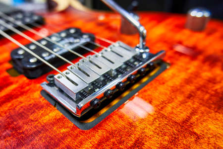 Electric guitar bridge close up. Guitar deck with chrome partsの写真素材