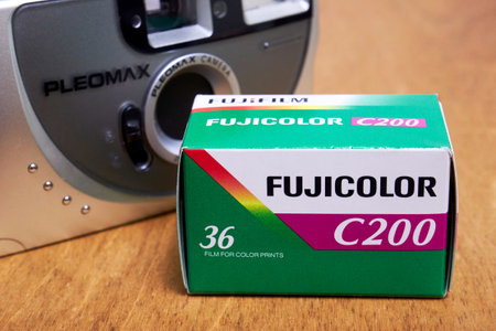 Ryazan, Russia - January, 15 2022: Fujifilm film packaging and compact camera close up