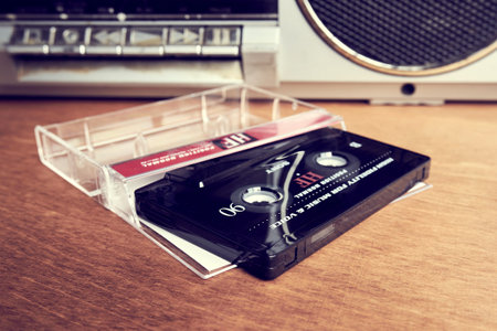 Ryazan, Russia - July 17, 2022: Sony compact cassette on the table next to the tape recorderのeditorial素材