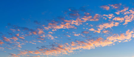 Blue sky and clouds at sunset wide panoramaの写真素材