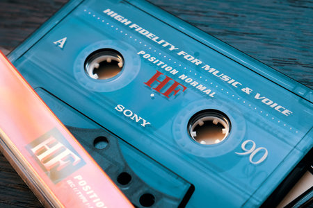 Vintage Sony audio cassette tape on wooden background, close up. Retro music concept. Selective focusのeditorial素材