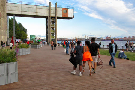 Saint Petersburg, Russia - July 29, 2023: People walk on the embankment of the Gulf of Finlandのeditorial素材