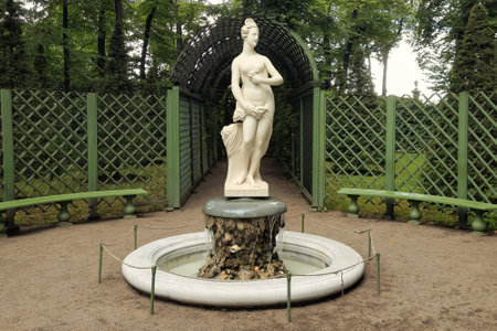 Saint Petersburg, Russia - July 29, 2023: Fountain with a marble statue of an ancient Greek goddess in the Summer Gardenのeditorial素材
