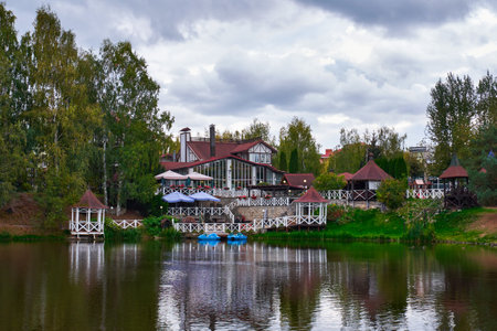 Ryazan, Russia - October 5, 2023: Beautiful restaurant on the lake in a city parkのeditorial素材
