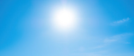 Blue wide sky background with white clouds, soft focus and copy spaceの素材