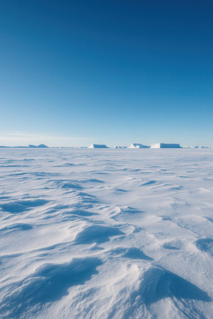 Icebergs in the Arctic. Winter landscape with snow and blue sky.の素材