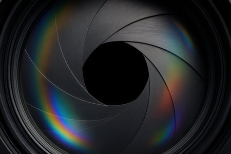 Iridescent Rainbow Reflections on Black Camera Aperture Blades Forming Circleの素材