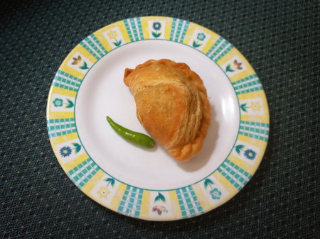 pastel refers to a type of kue filled with meat, vegetables, and rice vermicelli deep fried in vegetable oil. It is consumed as a snack and commonly sold in Indonesian traditionalの写真素材