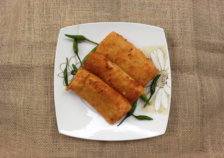 Risoles Ragout Indonesian Traditional savory snack filled with chicken mix vegetable coating with bread crumbの写真素材