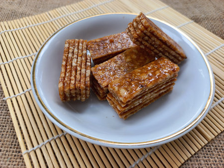 stack of ting ting enting enting indonesian traditional sweet peanut brown sugar candy snack