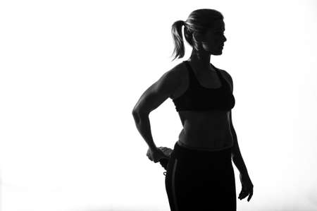 Image of fitness woman in sports clothing Young female model with muscular bodyの写真素材