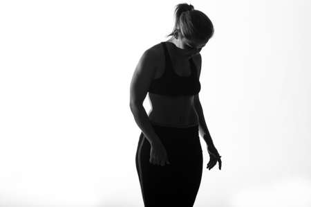 Image of fitness woman in sports clothing Young female model with muscular bodyの写真素材