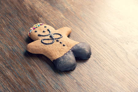 ginger bread man on a wooden table