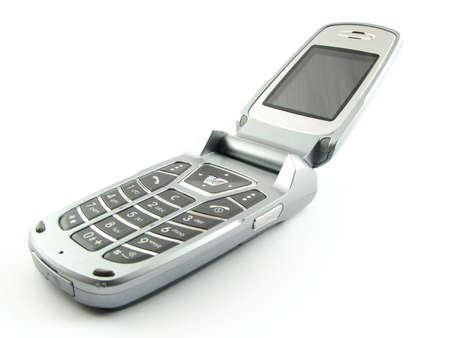 Modern clamshell phone isolated on a white backgroundの写真素材