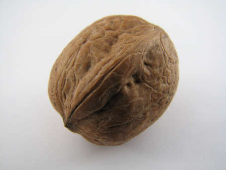 A closeup of walnut isolated on white