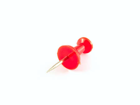 A red pushpin isolated on whiteの写真素材