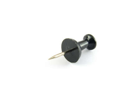 A black pushpin isolated on whiteの写真素材
