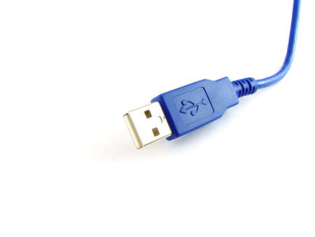 A blue USB cable isolated on whiteの写真素材
