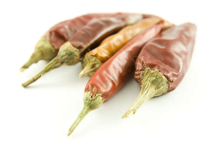 Red and yellow chili pepper isolated on a white backgroundの写真素材