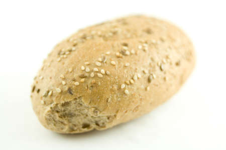 A piece of whole-grain bread isolated on a white backgroundの写真素材
