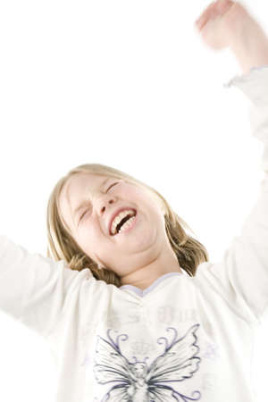 A girl having fun in front of the cameraの写真素材