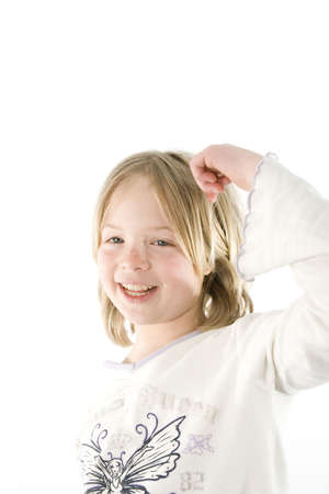 A girl having fun in front of the cameraの写真素材