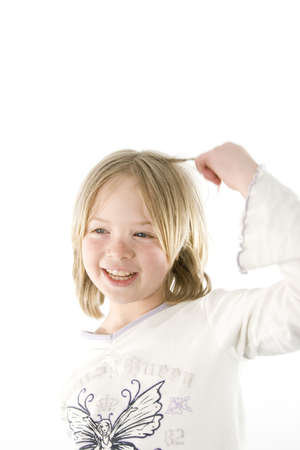 A girl having fun in front of the cameraの写真素材