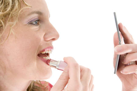 Attractive blonde with a lipstick isolated on white の写真素材