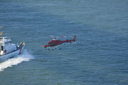 Coast Guard helicopter on a rescue missionの写真素材