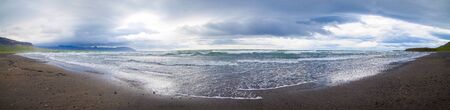 Waves at volcanic beach at Cape Dyrholaey, the most southern point of Iceland の写真素材