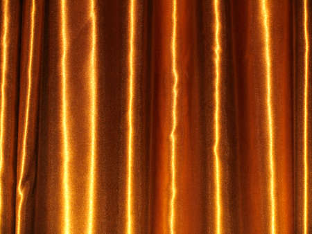 Folds of silk fabric in golden tonesの写真素材