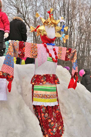 Doll Maslyonushka in traditional clothes made by children for holiday of Shrovetide, February 22, 2015, Tula, Russiaのeditorial素材