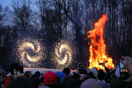 Traditional burning of Maslenitsa Scarecrow on seeing Russian winter on last day of Shrovetide....
