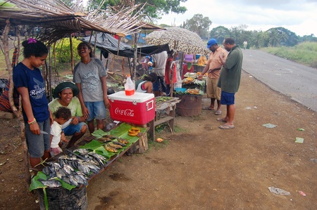 People are saling fruits and vegitables on market at roadside in Papua New Guineaのeditorial素材