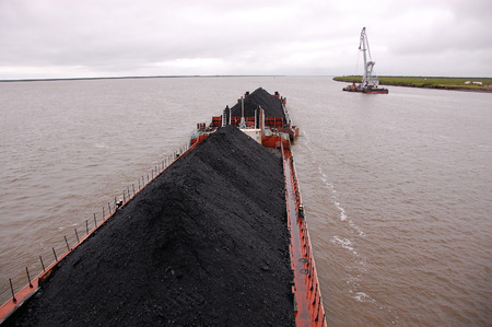 Cargo ship with coal at Kolyma river Russia outback, Yakutia regionのeditorial素材