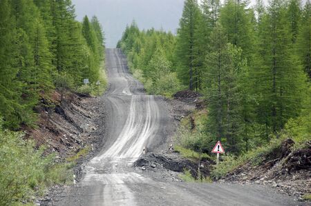 Gravel road at Kolyma state highway Russia outbackの写真素材
