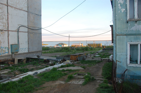 Houses of Chersky town at Kolyma river coast, Yakutia, Russiaの写真素材