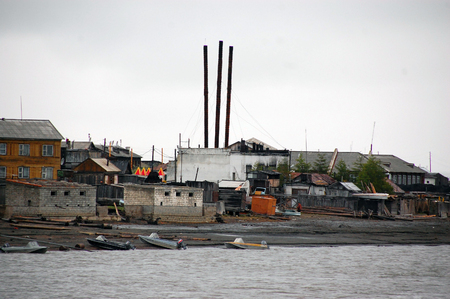Chimney of boiler station at Kolyma river town, Yakutia, Russiaの写真素材